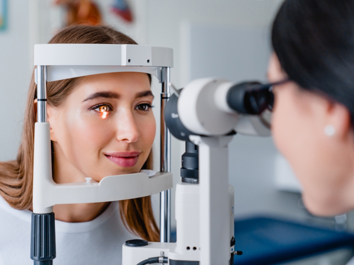 A woman getting an eye exam